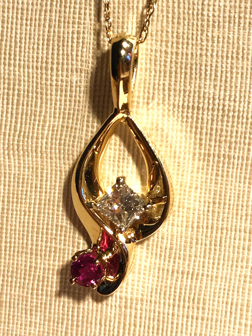 front-view-princ-diamond-ruby-pendant-14kt-y-gold